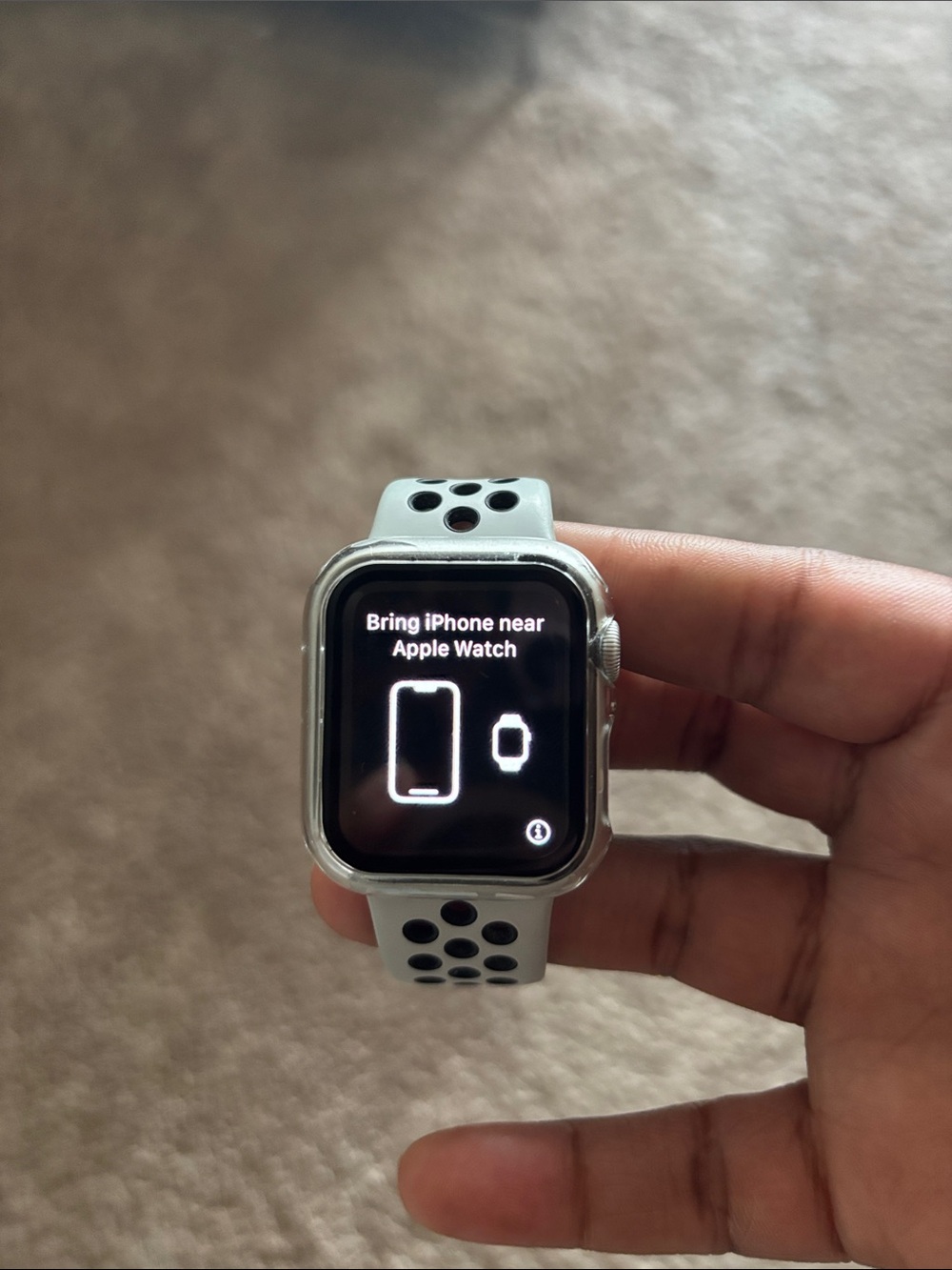 Apple Watch Silver Case with Light Gray and Black Perforated Sport Band
